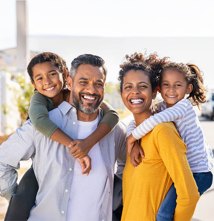 Smiling Family Of Four